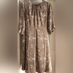 Fully lined Dainty Jewels dress. Size medium. Brand new with tags